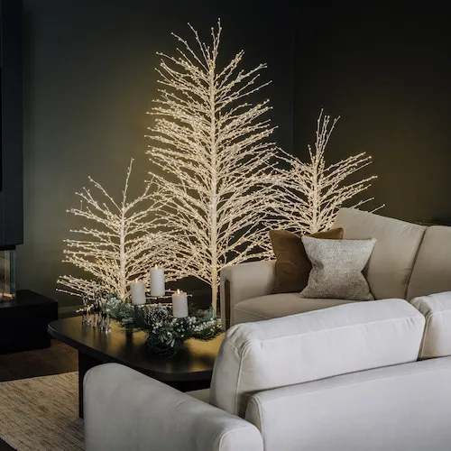 LED Christmas trees at EZ Living Furniture.